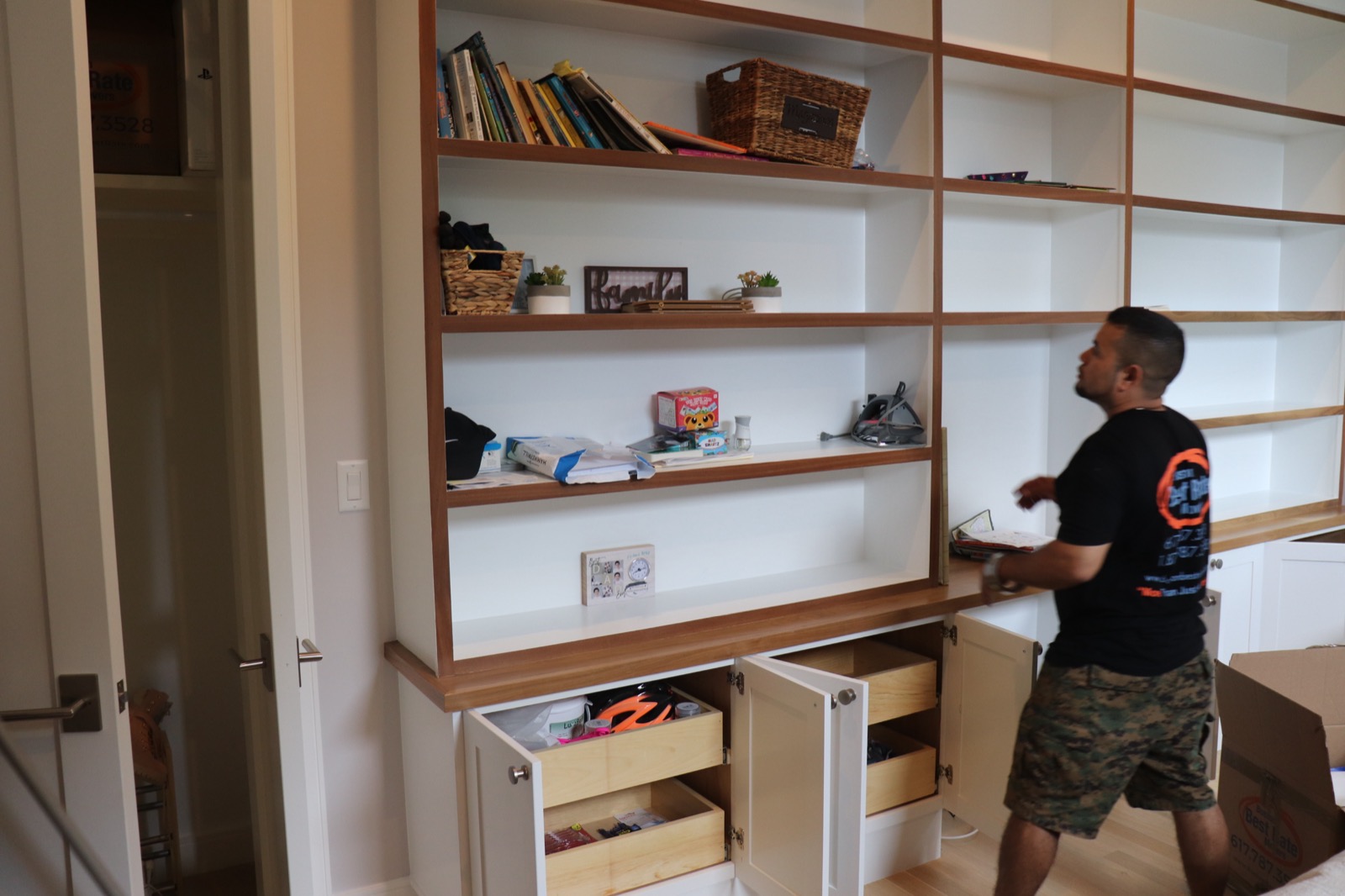 BBRM crew packing boxes at an office desk