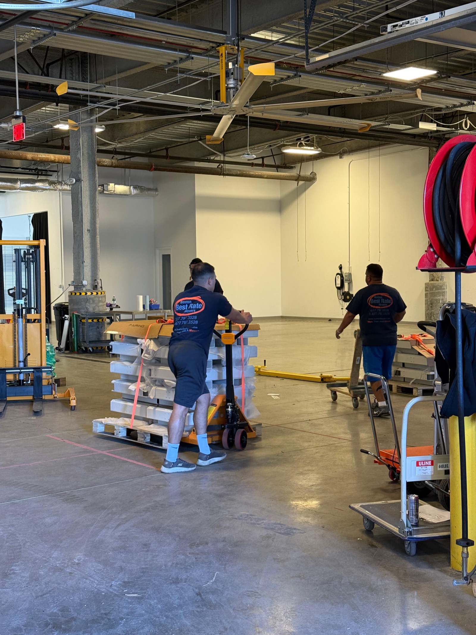 BBRM crew working in a large commercial warehouse