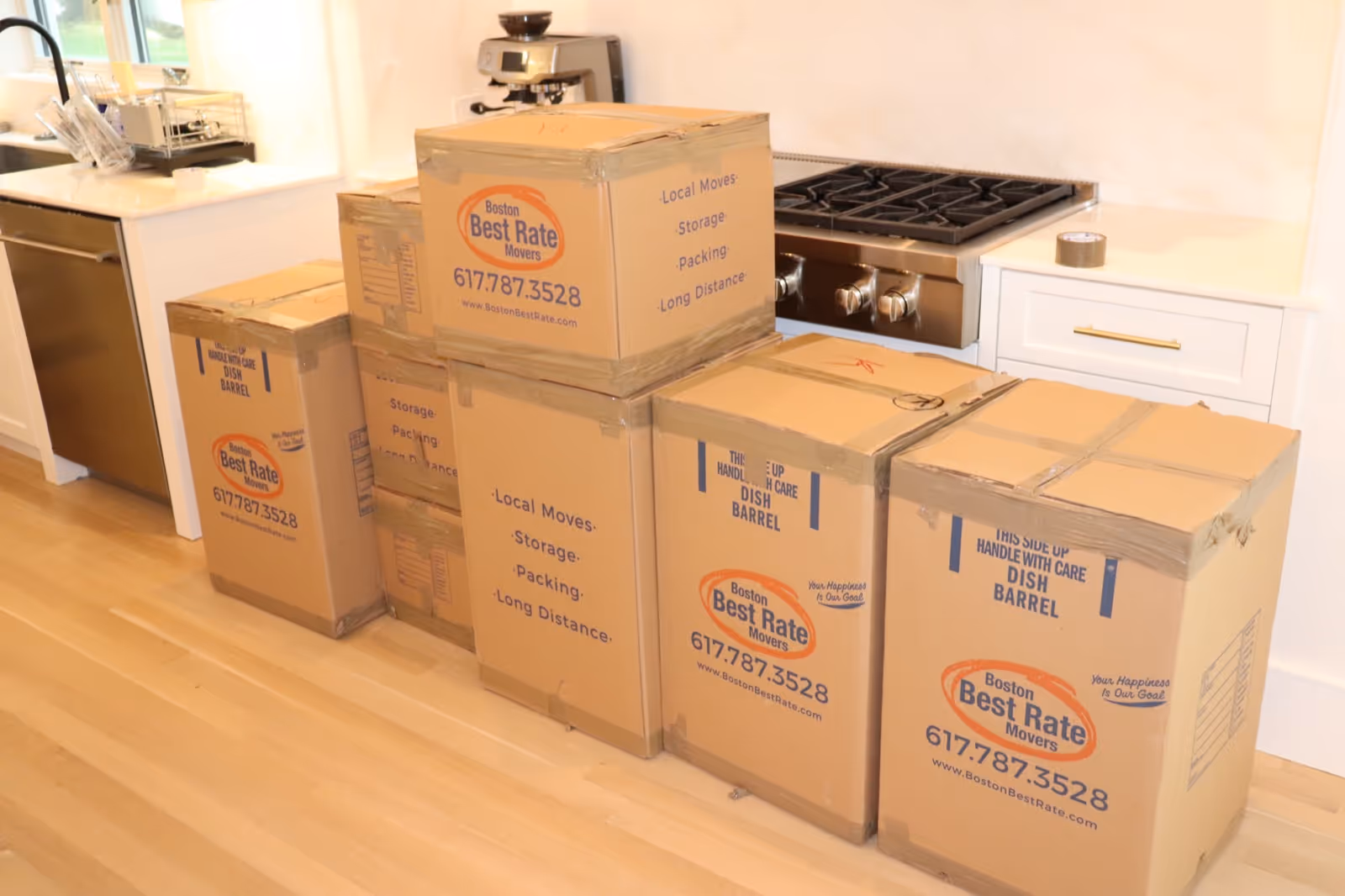 BBRM branded moving boxes packed in a bright kitchen