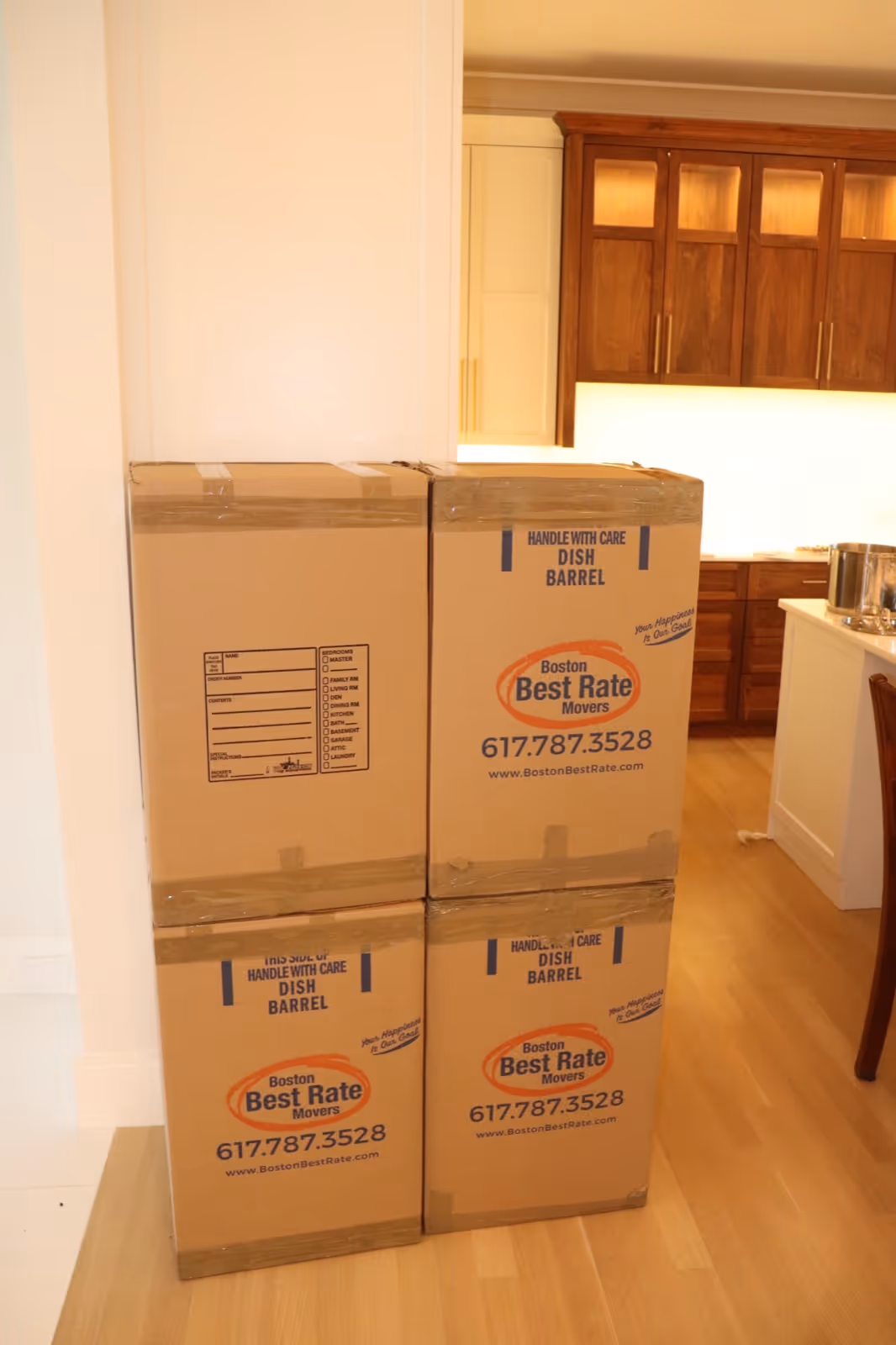 Moving boxes packed and labeled in a home