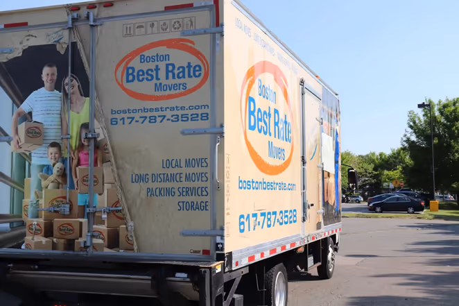 Boston movers loading a truck — experienced Boston Best Rate Movers crew