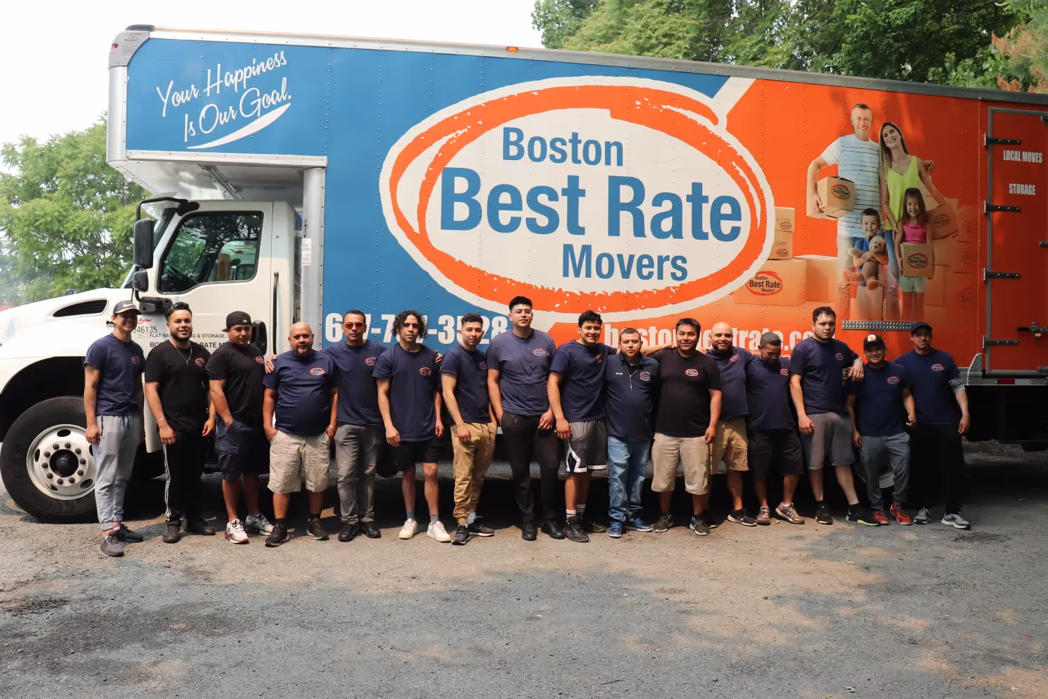 Boston Best Rate Movers team standing in front of a large branded moving truck