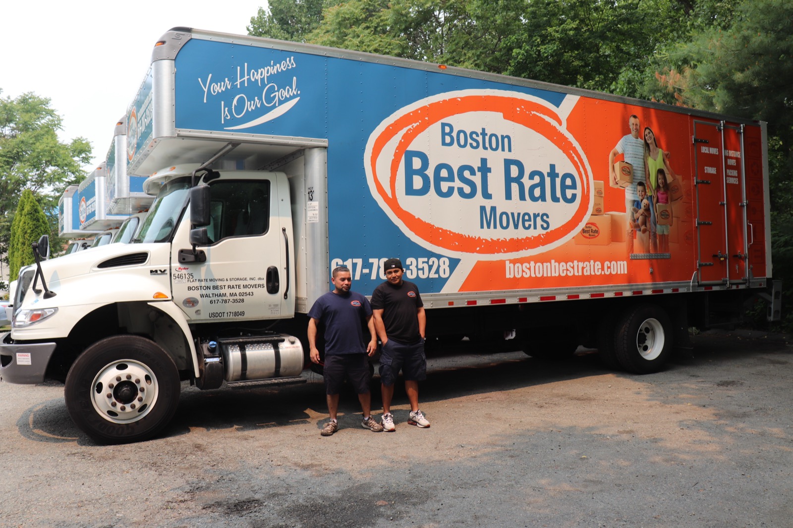Two BBRM movers standing in front of branded truck