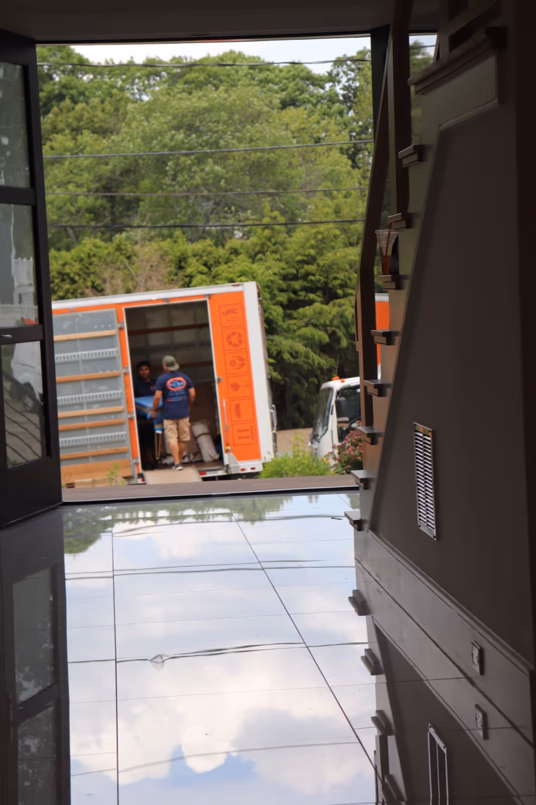 Boston Best Rate Movers crew loading items into a packed moving truck