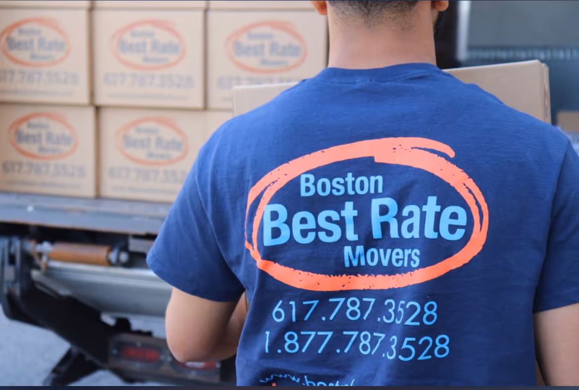 Boston Best Rate Movers crew member loading boxes into truck